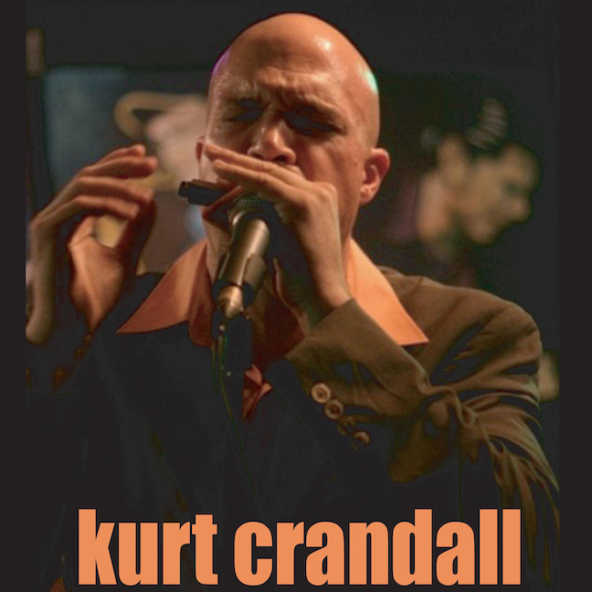 Kurt Crandall playing harmonica