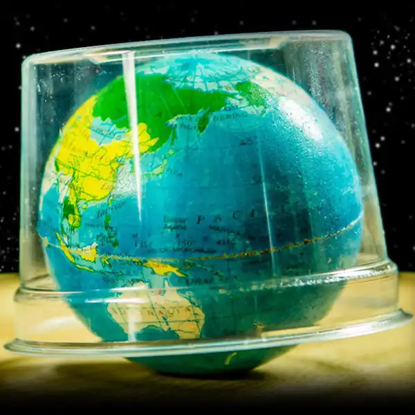 plastic cup covering earth globe