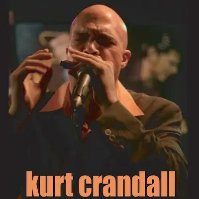 Kurt Crandal playing harmonica